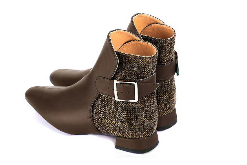 Dark brown women's ankle boots with buckles at the back. Square toe. Flat flare heels. Rear view - Florence KOOIJMAN